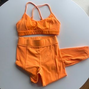 ALO Yoga - sold as set size small top, XS leggings. CA poppy or marigold color